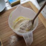 11 Add 300g of flour and 1/4 cup of water.