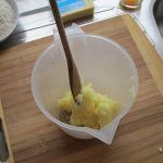8 I've put the dripping into a jug an smashed it up with a wooden spoon.