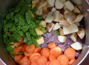 add diced veg diced potatoes, carrots, mange tout and neep