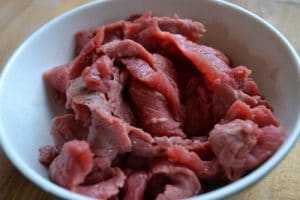 sliced beef in bowl