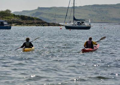 Canoeists in Newton Bay, Millport