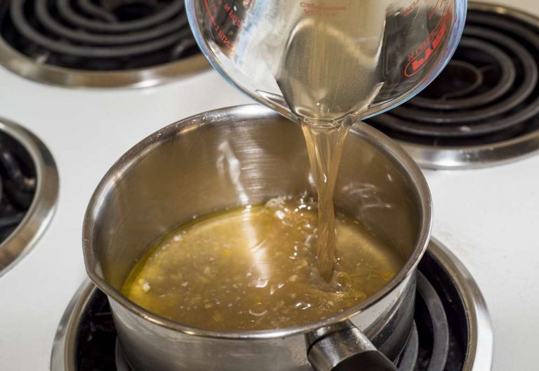 pour broth into pot