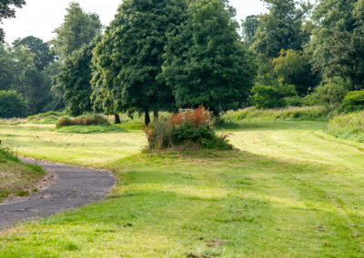 A well maintained grassy area next to the Gryfe