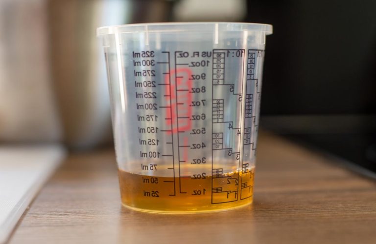 apple juice in measuring cup