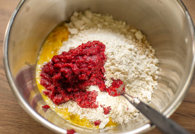 Adding beetroot to biscuit mix