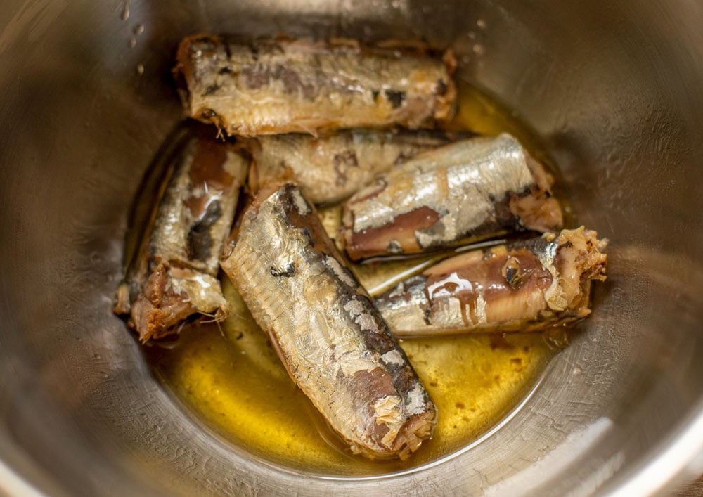 sardines in a mixing bowl