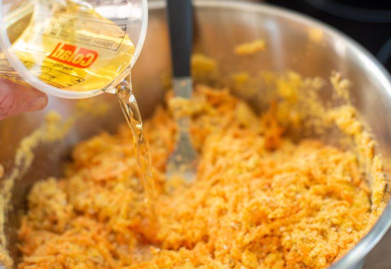 adding liquid to mixing bowl