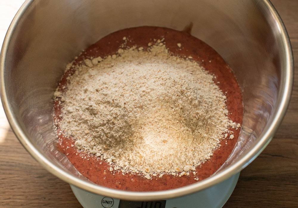 mixing bowl with liver cake mix and flour