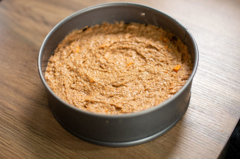 carrot cake batter in cake tin