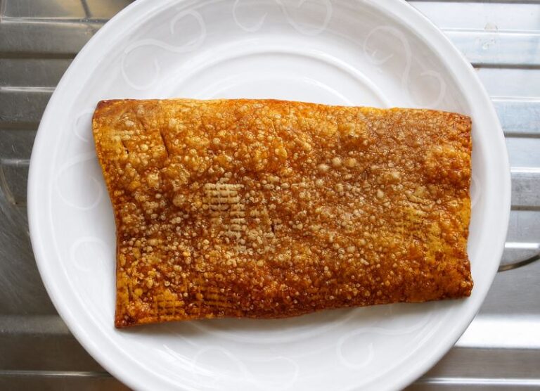 cooked pork rind on a plate