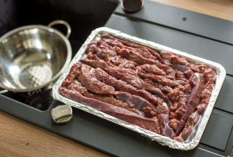 strips of liver on baking tray