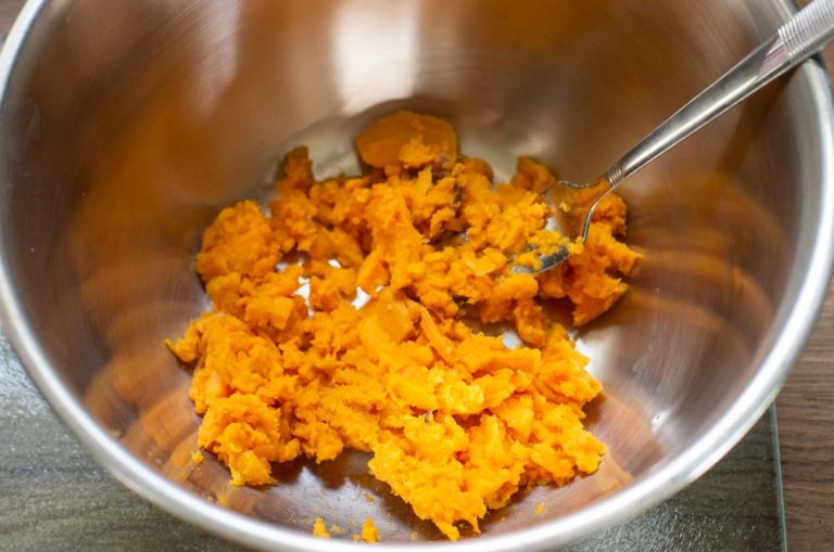 mashed sweet potato in mixing bowl